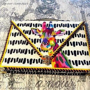 Sassy Jones stylish giraffe clutch!